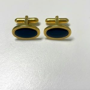 Cuff links gold and black. Great condition